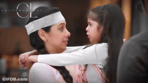 Woman In Headband Hugging Little Girl GIF
