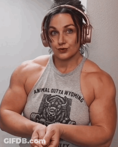 Woman In Headphones And Animal Outta Wyoming Tank Top GIF