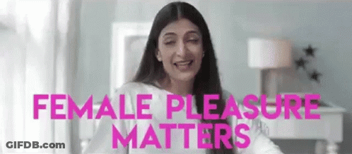 Woman In Headphones And Half Cone Hat GIF