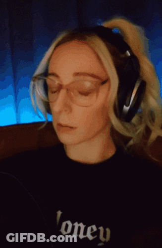 Woman In Headphones And Honey Shirt GIF
