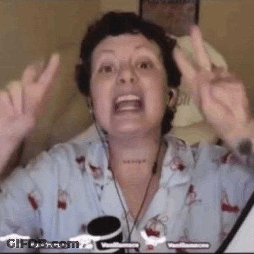 Woman In Headphones And Pajama Top Making Peace Sign GIF