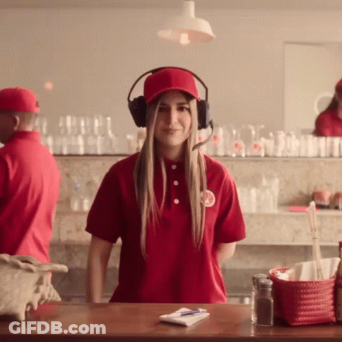 Woman In Headphones And Red Coca Cola Shirt GIF