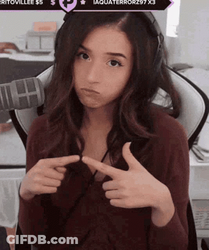 Woman In Headphones And Red Shirt Pointing At Herself GIF