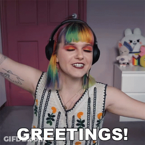 Woman In Headphones And Sweater Says Greetings GIF