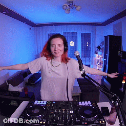 Woman In Headphones At DJ Controller GIF
