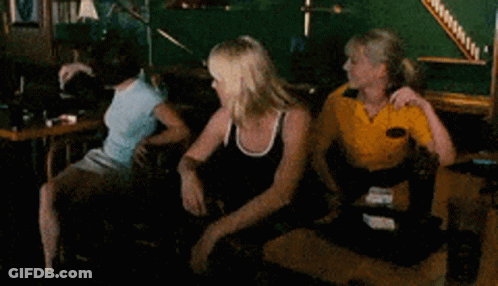 Woman In Headphones Dancing In Front Of Dog GIF