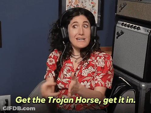 Woman In Headphones Get Trojan Horse Get It In GIF