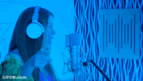 Woman In Headphones Singing Oh-Oh Into Mic GIF