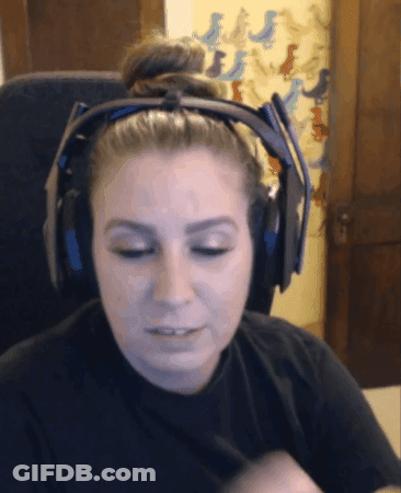 Woman In Headphones Sitting In Chair Eyes Closed GIF