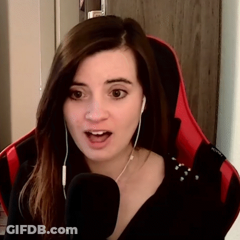 Woman In Headphones Talking Into Microphone In Red Chair GIF