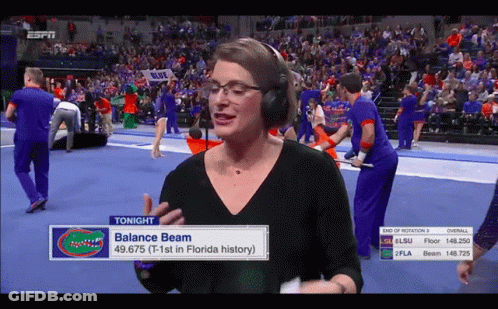 Woman In Headphones Talks About Balance Beam In Florida History GIF