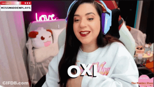 Woman In Headphones Wearing Oxi Sweatshirt GIF