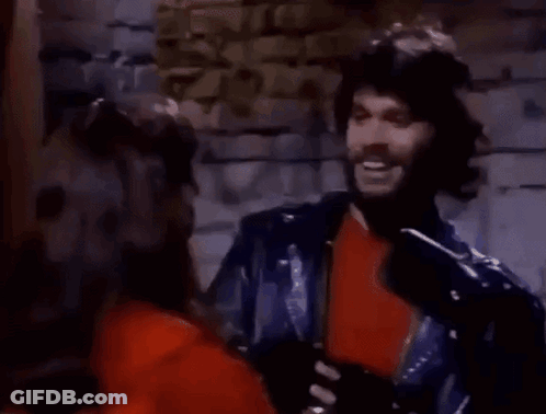 Woman In Helmet And Red Jacket Talking On Cell Phone GIF