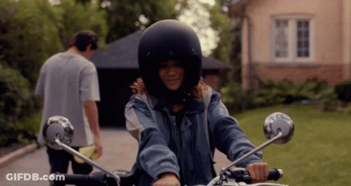 Woman In Helmet Rides Motorcycle GIF