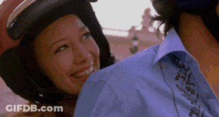 Woman In Helmet Smiling At Man GIF