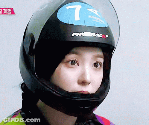 Woman In Helmet With Number 7 GIF
