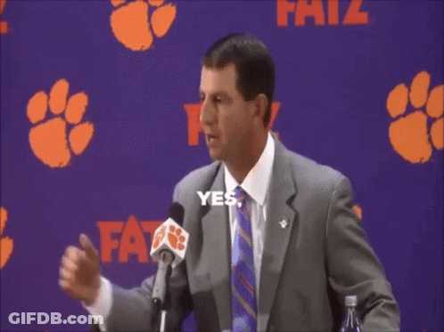 Woman In Hokies Jersey Laughing In Stands GIF