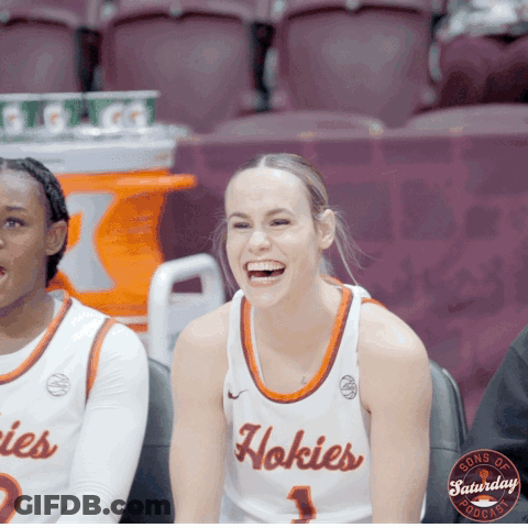 Woman In Hokies Jersey Laughing In Stands GIF