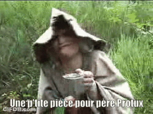 Woman In Hooded Cape Holding Cup In Field GIF