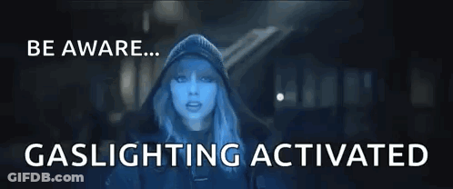 Woman In Hooded Jacket Dark Room Be Aware Gaslighting Activated GIF