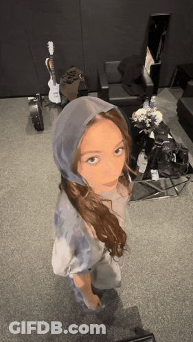 Woman In Hooded Shirt With Guitar GIF