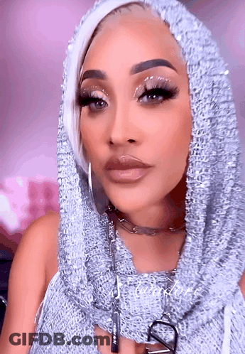 Woman In Hooded Sweater With Letter V GIF