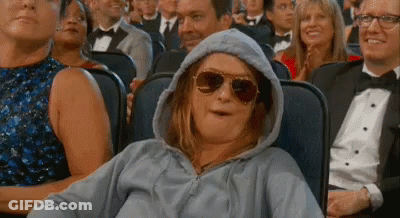 Woman In Hoodie And Sunglasses In Movie Crowd GIF