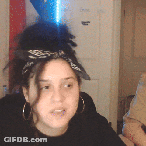 Woman In Hoop Earrings And Headband With S GIF