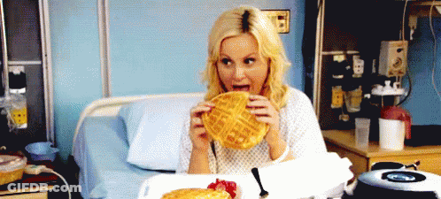 Woman In Hospital Bed Eating Waffles GIF