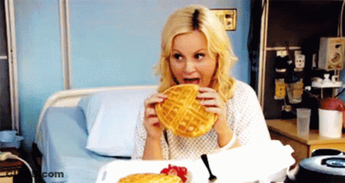 Woman In Hospital Bed Eating Waffles GIF