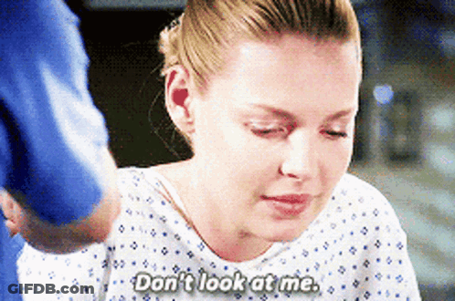 Woman In Hospital Gown Saying Don't Look At Me GIF