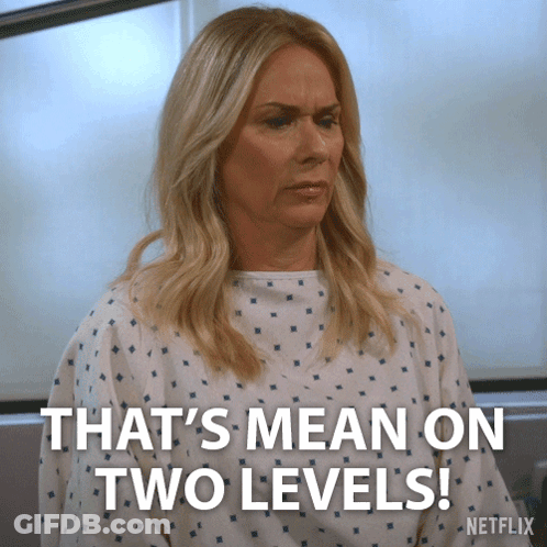 Woman In Hospital Gown Saying That's Mean On Two Levels GIF