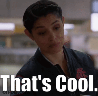Woman In Jacket Saying That's Cool GIF