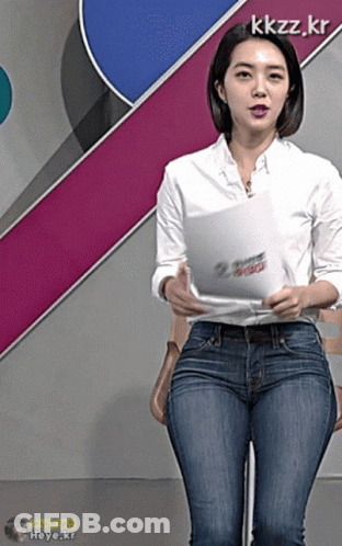 Woman In Jeans Holding Paper With Kkzz.kr GIF
