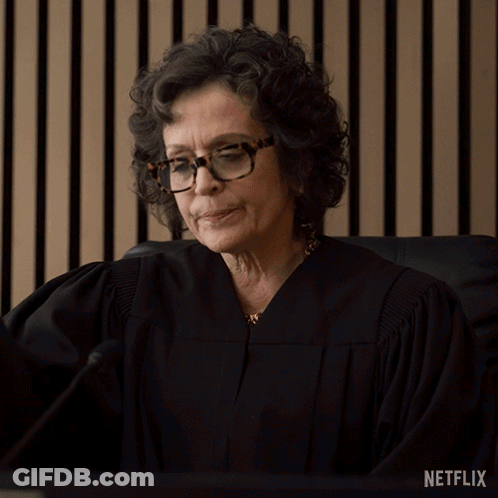 Woman In Judge Robe Says Continue Netflix Ad GIF