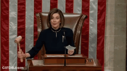Woman In Judge's Chair Holding Hammer GIF