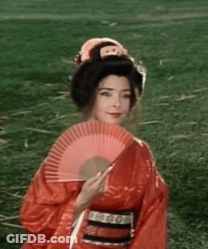Woman In Kimono Holding Fan GIF