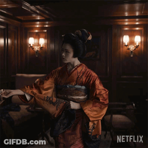 Woman In Kimono Holding Netflix Fan GIF