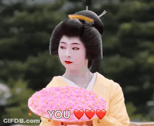 Woman In Kimono Holding Pink Flowers Saying You GIF