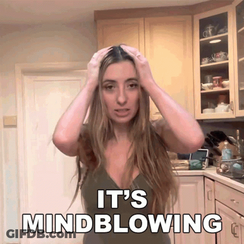 Woman In Kitchen Hands On Head Saying Mindblowing GIF