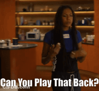 Woman In Kitchen Saying Can You Play That Back GIF