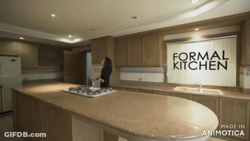 Woman In Kitchen Saying Formal Kitchen GIF