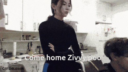 Woman In Kitchen With Come Home Zivvy Poo GIF