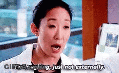 Woman In Lab Coat Laughing Saying I'm Laughing Just Not Externally GIF