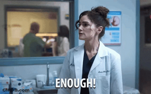 Woman In Lab Coat Saying Enough In Hospital GIF
