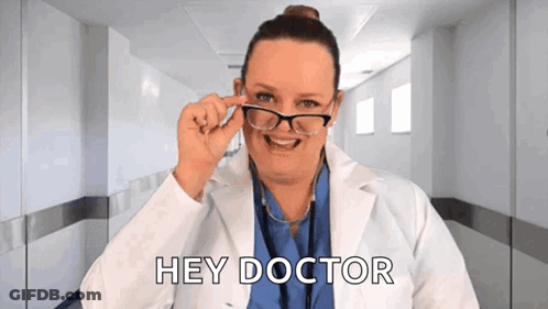 Woman In Lab Coat Saying Hey Doctor GIF