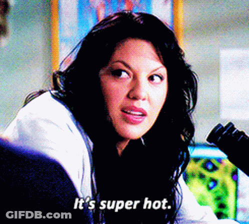 Woman In Lab Coat Saying It's Super Hot GIF