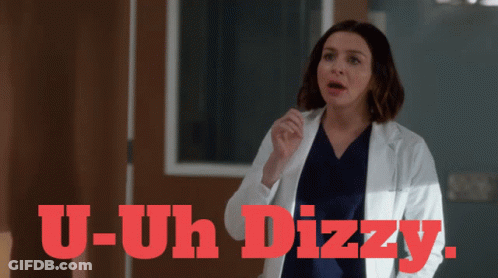 Woman In Lab Coat Saying U-Uh Dizzy GIF