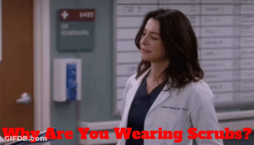 Woman In Lab Coat Saying Why Are You Wearing Scrubs GIF