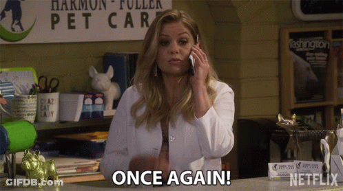 Woman In Lab Coat Talking On Phone GIF